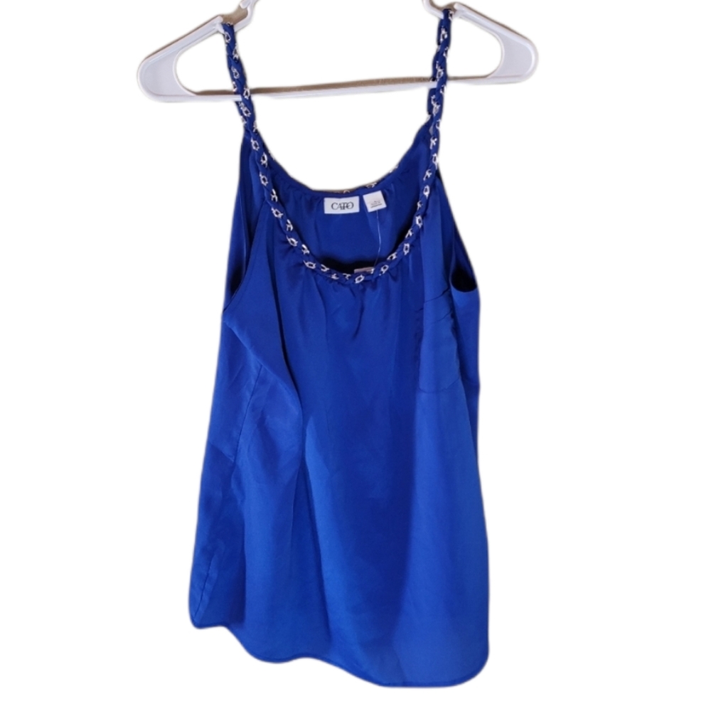 Blue sleeveless Cato top with scoop neckline.